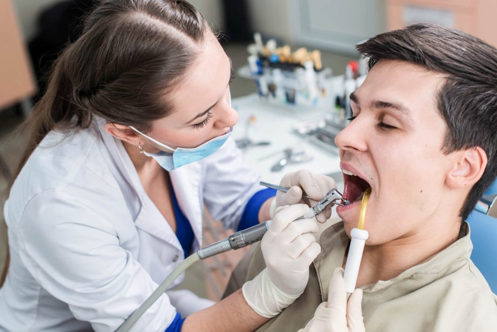 dentists determine if you need a root canal using pulp tests, percussion tests, and dental X-rays.