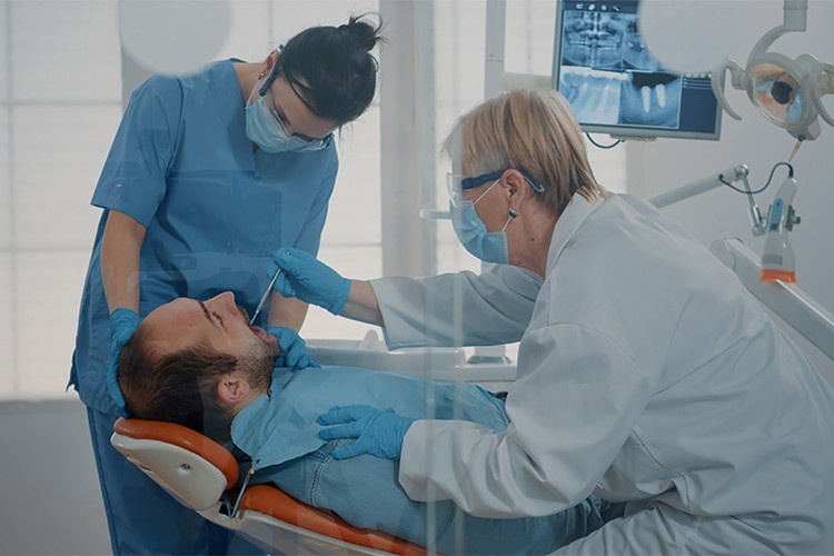Patient receiving advanced dental treatment, highlighting coverage considerations when choosing the best dental insurance in Toronto.