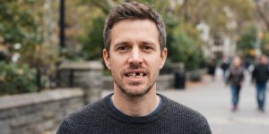 a man with missing teeth that needs know about dental implants vs bridges